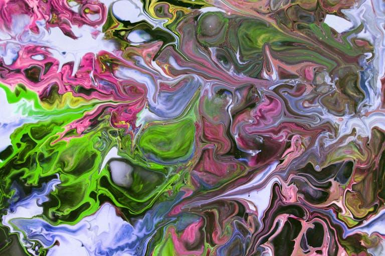 Vibrant abstract painting showcasing swirling patterns in pink, green, and white tones.